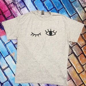 3/$15 Gray T-Shirt with Wink and Eye Design